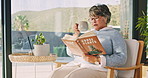 Tea, home and old woman with book for houseplant, relax and plant research in lounge. Elderly person, tips or reading guidebook info for knowledge development with coffee and calm retirement in house