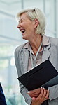 Woman, doctor or laughing in hospital for friendly discussion, funny joke or humor together. Business, female person or healthcare worker with smile or colleagues for comedy or conversation in clinic