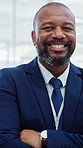 Face, investor and black man with confidence in hospital for medical funding or financial service. Portrait, male person or health finance with arms crossed or smile for aid or support in clinic