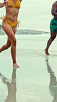 Running, friends and people on beach for holiday, vacation and bonding on summer weekend. Nature, happy and men with women by ocean for travel, island adventure and trip for fun, freedom and getaway