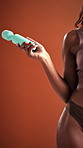 Hands, sensual and woman with sex toy in underwear for self pleasure, passion and personal intimacy. Space, body and person with vibrator for education, wellness and stimulation on studio background