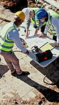 Architect, blueprint and people outdoor at construction site with discussion, building and excavation. Planning, men and woman together for teamwork, collaboration and above civil engineering project