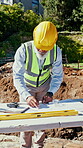 Architect, blueprint and man outdoor at construction site with strategy, building and excavation. Planning, mature person and floor plan for foundation, property and civil engineering project