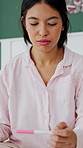 Pregnancy test, nervous and woman on bed in home with anxiety for family planning or bed news. Maternity, mistake and person with fertility stick in bedroom with concern, scared or stress in house.