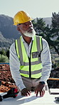 Architect, inspection and black man at construction site with blueprint, PPE or property development. Mature person, thinking or check design document outdoor for architecture, planning or evaluation