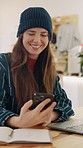Laptop, phone and woman in coffee shop for remote work, blogging or project research break. Tech, notebook and message with happy person in cafe for freelancer, communication and text for agency