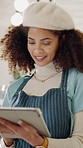 Tablet, happy and barista in cafe for research on inventory, stock list or website menu update. Digital technology, woman and waitress with for online order for hospitality service in coffee shop.