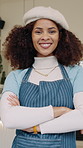 Face, happy and woman in coffee shop with crossed arms for welcome, friendly service and about us. Portrait, hospitality and person with pride, positive attitude and manager for cafe or restaurant