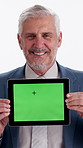 Face, mature or businessman with tablet green screen in studio for marketing on a white background. Portrait, man or presentation with smile, technology display for online advertising on mockup space