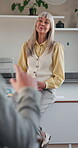 Teacher, talking and classroom for question, college education and learning for development in school. University, teaching and happy or mature woman with students for lesson, support and interaction