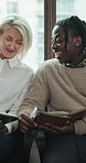 Tablet, hiring or people in waiting room with smile, resume tips or application help with notebook. Recruitment, line or happy candidates with tech for job search, interview guidance or hr discussion