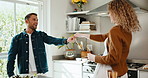 Love, fun and couple in kitchen with dance, romantic moment and bonding together on weekend break. Happy, groove and people in house with spin, rhythm and playful connection in healthy relationship.