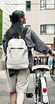 Travel, back and woman with bicycle in town for morning commute, adventure and journey. Explore, cycling and Japanese person on bike for urban trip, sustainable or eco friendly transport outdoors