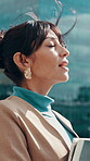 Thinking, walk or businesswoman in city with breathing, fresh air or mindfulness in work commute. Daydream, wind or mature person with tech, perspective or peaceful mindset in employee journey.