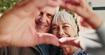 Heart hands, smile and face of old couple outdoor for romantic connection, support and bonding. Partner, trust and commitment gesture with senior man and woman in backyard of home for loyalty