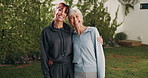 Face, hug and senior mother with daughter outdoor in backyard for visit, connection or bonding. Portrait, laugh and elderly woman in retirement with care of offspring for relationship of family
