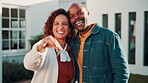 New home, face or happy couple with keys in front yard for mortgage purchase, moving in or pride. Real estate, mature african people or hug with keychain outdoor for relocation, dream house or laugh
