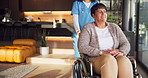 Caregiver, help and old woman in home with wheelchair, smile and medical treatment for rehabilitation. Nurse, support and push happy senior person with disability, healthcare and injury recovery.