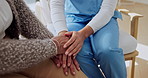 Comfort, nurse and holding hands with senior woman for reassurance, connection and empathy. Caregiver, trust or person in retirement with kindness, hope or support for health diagnosis with home care