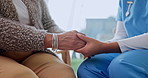 Trust, caregiver and holding hands with senior woman for reassurance, connection and empathy. Nurse, support or person in retirement with kindness, hope or comfort for health diagnosis with home care