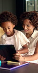 Mother, son and tablet with homework in home for education, distance learning and support with care. African family, parent and kid with tech for child development, online project or task assignment