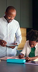 Child, writing and dad with tablet in kitchen, online education or helping son with homework in home. Family, study and black man with technology for research, academic development and happy in house