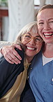 Security, nurse or old woman in house with face, understanding or bonding in elderly care. Support, caregiver or senior person with embrace, loving connection or happy relationship in retirement.