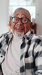 Face, old man and relax at house with smile, peace and comfortable for weekend break on sofa. Portrait, senior person or laughing in home with positive attitude, retirement and calm morning to unwind