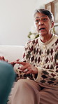 Senior, woman or talking with therapist for marriage counseling or relationship advice on sofa. Elderly, female person or speaking with shrink or counsellor for conflict resolution, support or help