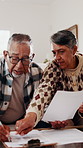 Old couple, documents and confused in home with taxes, income issue and pension funding for retirement. Elderly man, woman and paperwork for discussion, investment and financial compliance in lounge