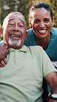 Face, caregiver and old man outdoor in wheelchair with support, medical help or laugh for funny joke. Happy, nurse and senior person with disability, humor or healthcare assistance for rehabilitation