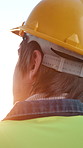 Thinking, contractor and back of man outdoor for construction, property development or planning. Architecture, civil engineer and person with idea, flare and insight for building expansion in morning