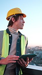 Thinking, man and construction worker in city with tablet for research on building repairs. Planning, digital technology and civil engineer with email for feedback on renovation approval on rooftop.