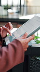 Hands, scroll and tablet screen in office with data analysis, ESG research and stats for sustainability. Climate analyst, person and review carbon footprint in business with tech, graphs and insight.