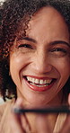 Woman, laugh and speaker phone in apartment with funny conversation, gossip story and social media. Happy, African person and discussion in home living room with tech, contact or humor for voice note