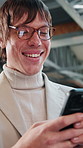 Laugh, typing and business man with phone for text message, networking or communication. Mobile, funny person and online chat in office with meme notification, social media post and browsing internet