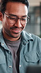 Business, man and smile with laptop in office for newsletter review, editing article and approval. Creative, editor and happy with tech at media agency for story draft, grammar check or proofreading