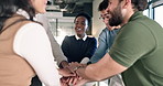 Happy, team and hands together with applause in office for winning, celebration or achievement. Excited, group or employees piling with stack or clapping for social cohesion or synergy in workplace
