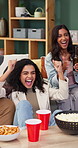 Home, cheering and friends on sofa for sports game, match and team support for tournament. Excited, happy and people with fist pump, celebrate and streaming competition for victory, event and goal