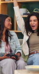 Happy, winning and friends on sofa for video games, online competition and playing together for bonding. Home, relax and women with console for entertainment, virtual challenge or victory on weekend