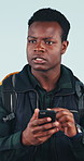 Travel, lost or black man with phone for bad signal, direction or navigation on a studio background. Traveler, confused or male person with smartphone for mobile location, network connection or app