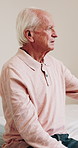 Serious, thinking and relax at house with old man, vision and calm morning for daydreaming. Thoughts, senior person and rest on bed with curiosity, reflection and nostalgia memory at retirement home