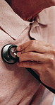 Nurse, hands and listening to heart beat with senior patient for health checkup or breathing exam. People, healthcare worker or monitoring with stethoscope for elderly care, medical test or help