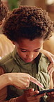 Mom, boy or pointing with phone in home for entertainment, online subscription or fun game together. Happy, child or kid with mother, smartphone or app for digital interaction, network or connection