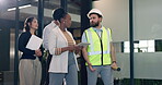 Business people, meeting and tablet for construction with group in office for development project. App, planning and walking with contractor speaking to woman in corporate workplace for renovation