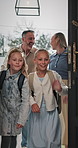 Happy, family or moving in with children for new home, relocation or property investment by door. Mom, dad or kids with smile for mortgage loan, fresh start or protection in shelter or house together