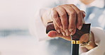 Senior woman, hands and cane for retirement, support or mobility aid for recovery in home. Elderly person with a disability, walking stick and healthcare for arthritis help, assistance or balance