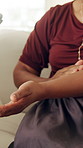 Arthritis, hands and joint pain with person on sofa in living room for carpal tunnel, injury or cramp. Inflammation, fatigue and muscle with mature woman in home for blood circulation and recovery