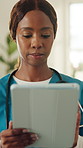 Nurse, healthcare and black woman with tablet for medical research, schedule or planning in home. Health worker, female person or caregiver with technology for Telehealth, ideas or routine in house