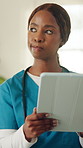 Nurse, thinking or black woman with tablet for schedule, planning or medical research in home. Thoughtful, female person or healthcare worker with technology for health routine, app or ideas in house